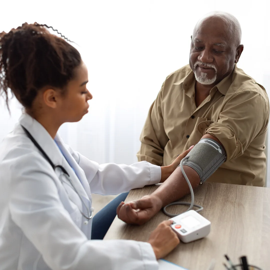 doctor checking blood pressure