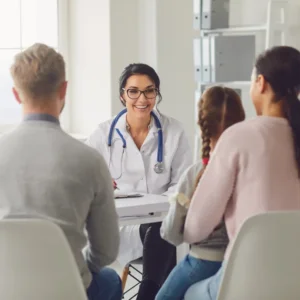 doctor talking with a family